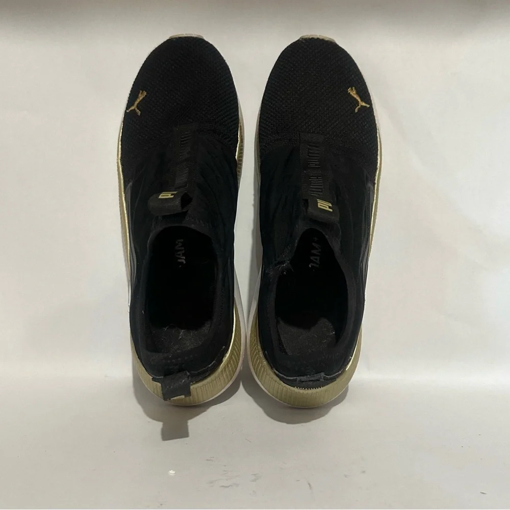 Puma Women’s Black and Gold Athletic Shoes